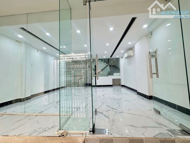 NHÀ HẺM NGUYỄN TRÃI – QUẬN 1, DT: 5x10M, KC: 1 HẦM+6 LẦU, HĐT 42 TRIỆU – GIÁ 16.5tỷ - 1