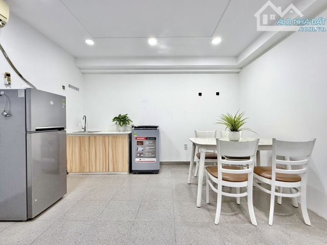 Tòa nhà 1 hầm 7 tầng hẻm 8m Út Tịch Tân Bình, gần sân bay, thu nhập 120 triệu/tháng - 1