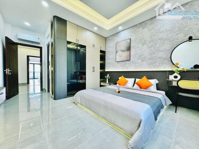 CHDV hẻm xe hơi 102m2 Nguyễn Xí, 7 phòng full NT cao cấp, doanh thu 55tr/tháng - 1