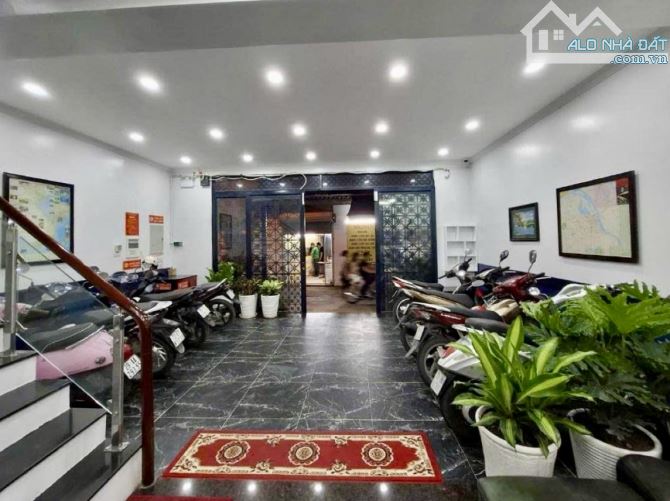 Siêu phẩm 9T thang máy Tây Sơn, 98m2, ngõ 3 ô tô tránh, kinh doanh, DT 1.5 tỷ/năm, gara - 1