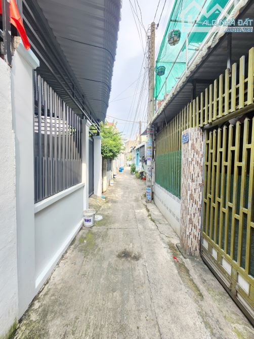 nhà 1 trệt 1 lầu 60,7m2 3ty8 TL gần chợ Xóm Vắng bờ hồ Xóm Vắng 200m, p.Dĩ An - 1