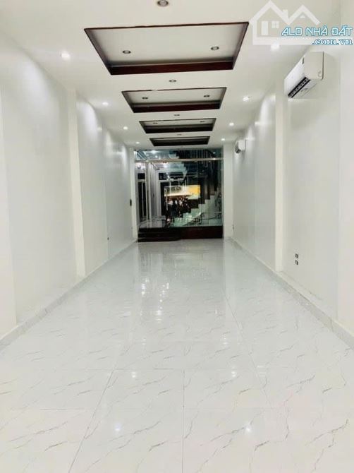 Mặt phố Vũ Thạnh 140m² MT 4.1m 7 tầng thang máy giá 42.5 tỷ dòng tiền 110tr/thán