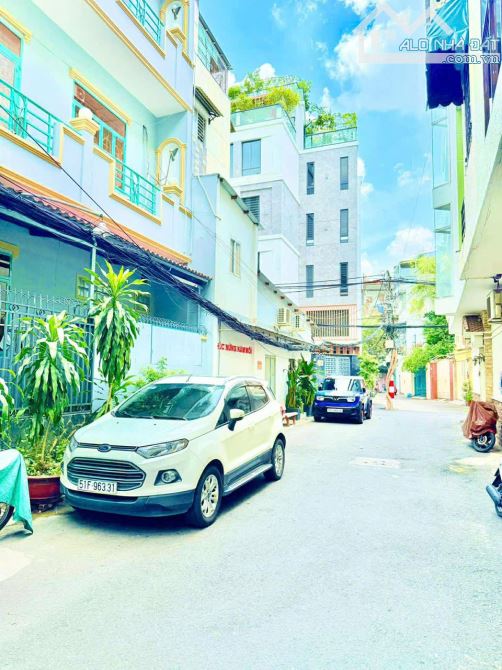 MẶT TIỀN QUẬN 1, NGAY SAU BỘ CÔNG AN TRẦN HƯNG ĐẠO. DT: 3.6 x 13, 4 lầu ST, Giá: 12.5 tỷ