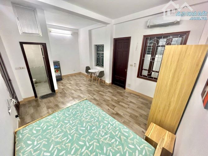 Nhà Dòng Tiền - phố Hồ Tùng Mậu, 97m, 8 tầng, 15 phòng, thang máy, dt 80tr/tháng, ngõ ô tô - 1