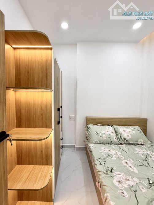 CẠNH QUẬN 1  XVNT P21 BÌNH THẠNH  35M  2 TẦNG  3PN  BAN CÔNG RỘNG  4.95 TỶ - 2