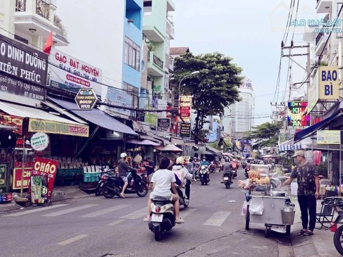 Nhà mặt tiền KD Tân Phú-Đường 12M-Ngay chợ Tân Hương-P.Tân Quý-107m2-4x27-4tầng-7PN