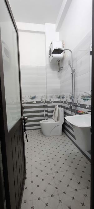 Nhà 3 tầng mới đẹp mặt ngõ Trần Nhân Tông - 3