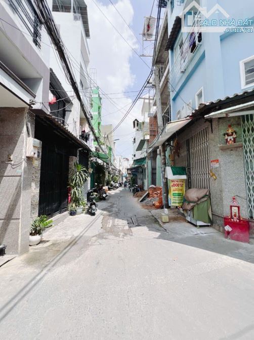 NHÀ CỦ XE HƠI TỚI NHÀ  NGANG 5.5 DÀI 13.5 M  TRUNGTÂM Q4 CÓ 90 TRIÊU M - 5