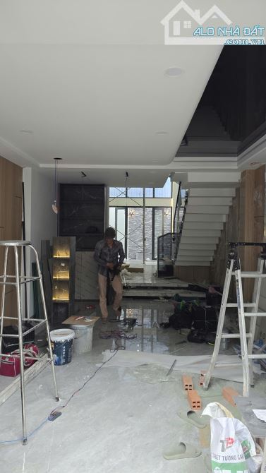 Bán nhà mới CC An Phú Đông, Q12, gần ĐH Nguyễn Tất Thành. DT 4x18m, 5tấm, HXH 12m, 7.35tỷ - 6