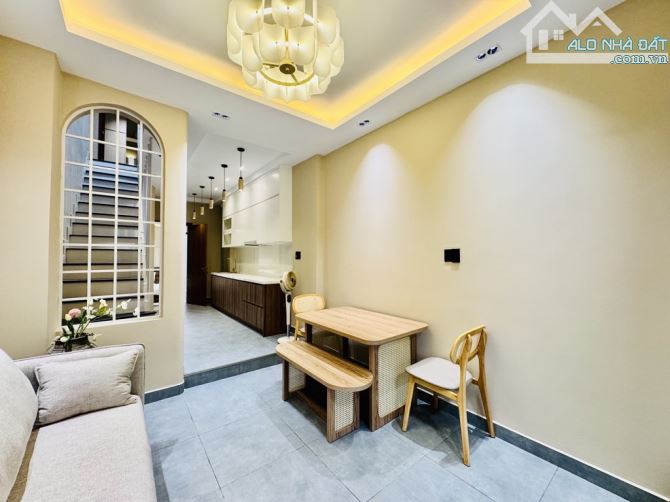 BÙI ĐÌNH TUÝ P 24 BÌNH THẠNH 50 M2 NHÀ 2 TẦNG 3PN HẺM XE HƠI THÔNG  KHU DÂN TRÍ - 2