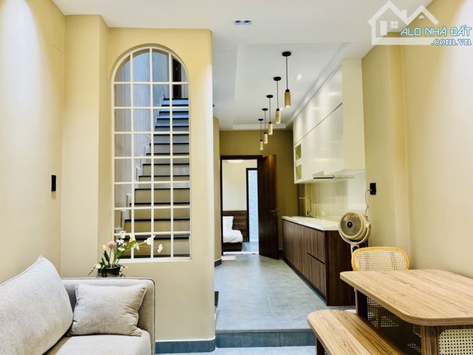 BÙI ĐÌNH TUÝ P 24 BÌNH THẠNH 50 M2 NHÀ 2 TẦNG 3PN HẺM XE HƠI THÔNG  KHU DÂN TRÍ - 3