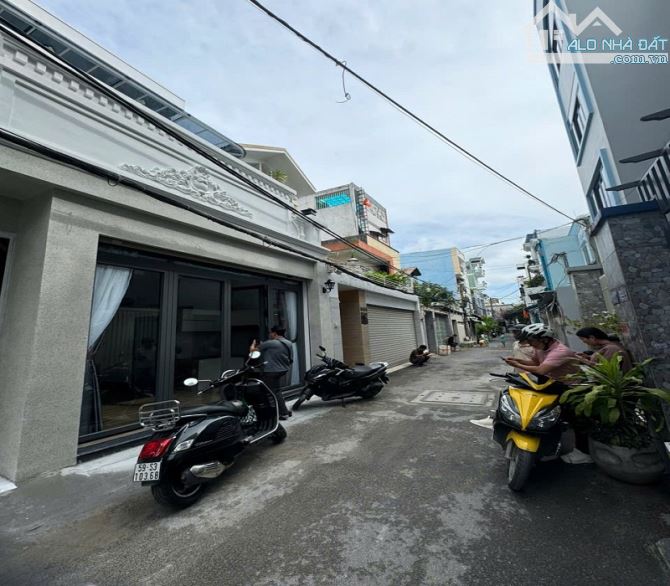 Bán CHDV HXH Lê Văn Thọ, P11, Gò Vấp, 128m2, 3 tầng, ngang 6,1m, dòng tiền 6%/năm - 5