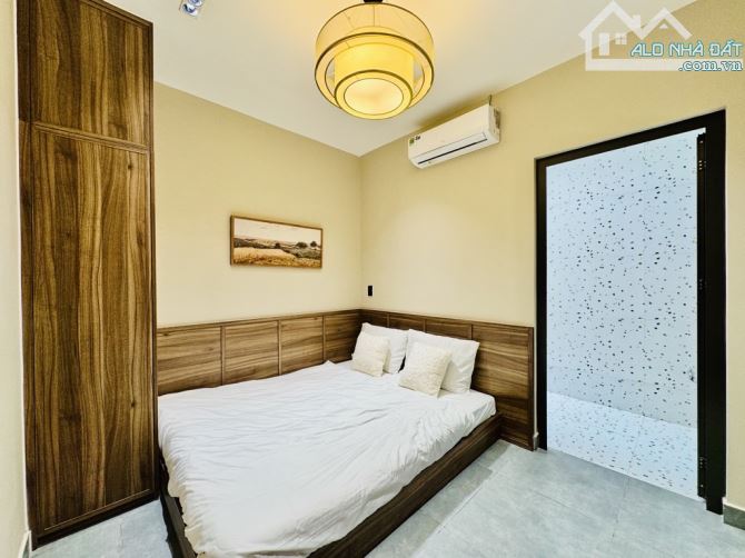 BÙI ĐÌNH TUÝ P 24 BÌNH THẠNH 50 M2 NHÀ 2 TẦNG 3PN HẺM XE HƠI THÔNG  KHU DÂN TRÍ - 9