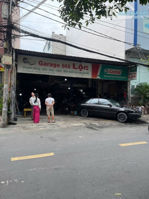 Bán đất MT Tân Quy - Quận 7 - DT 10x20m (nhà cũ tiện xây mới) - giá 36 tỷ