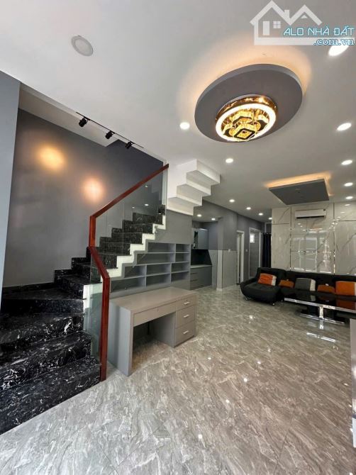 TT Quận 5 An Dương Vương-60m2- 2 tầng BTCT nở hậu.