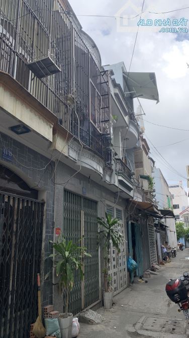 Nhà gần công viên Làng Hoa, Phường 9, Gò Vấp, 2 tầng, 30m2, HXH thông - 1