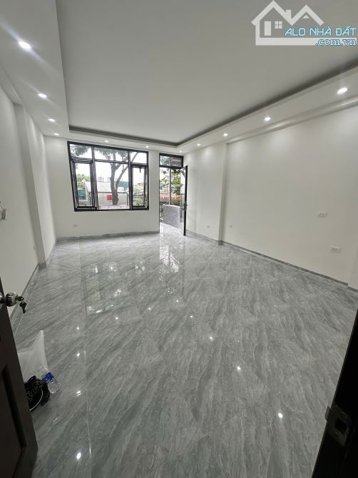 Cho thuê nhà mặt phố Trần điền, 90m2, thang máy, vỉa hè rộng - 2