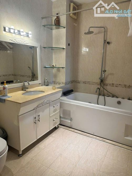 Mặt tiền đường ngay công viên An Khánh, gần Xa lộ Hà Nội ngang 5m dài 20m 5 tầng nhỉnh 27T - 2