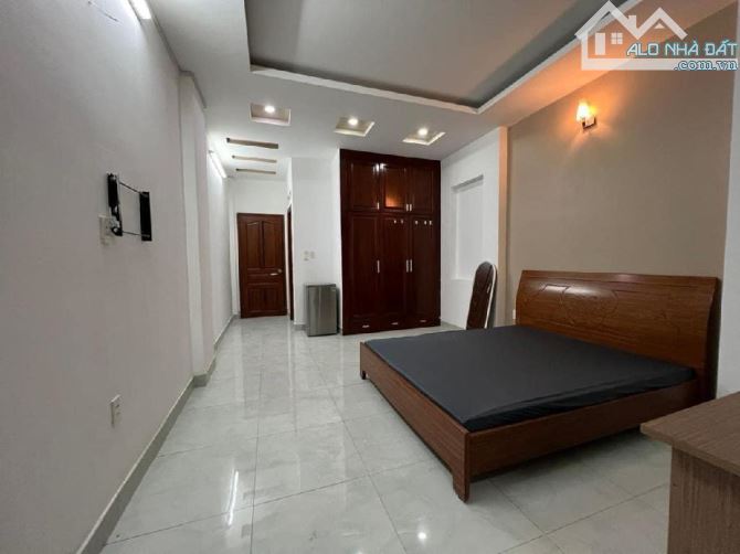 Mặt Tiền Dương Quảng Hàm - 112M² - 4Tầng BTCT - 12CHDV - 3