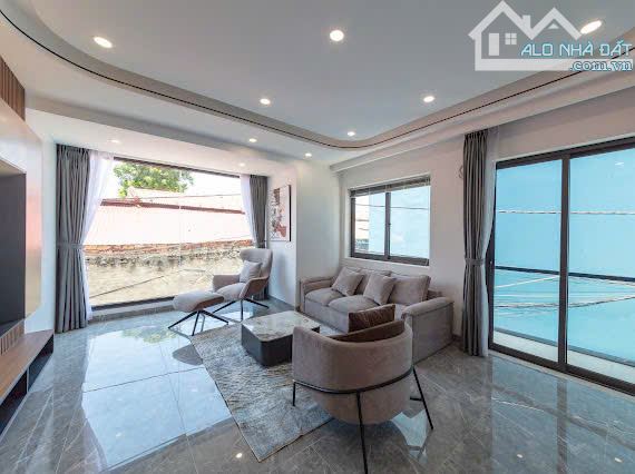 NHÀ NGUYỄN VĂN LINH LÔ GÓC, 6 TẦNG, THANG MÁY, GARO Ô TÔ, DT 50M2, MT 7M, GIÁ 9.05 TỶ. - 4