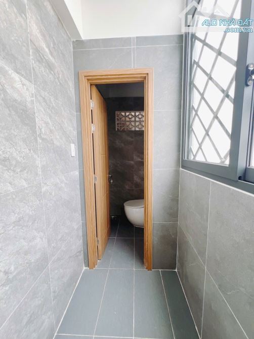 BÁN NHÀ ĐẸP MỚI XÂY KHU VIP ĐƯỜNG SỐ 4 TẤM Q4 XE HƠI ĐỖ CỬA 5PN GIÁ 11T5 TL SÁT MT - 5