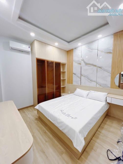 BÁN NHÀ ĐẸP MỚI XÂY KHU VIP ĐƯỜNG SỐ 4 TẤM Q4 XE HƠI ĐỖ CỬA 5PN GIÁ 11T5 TL SÁT MT - 6