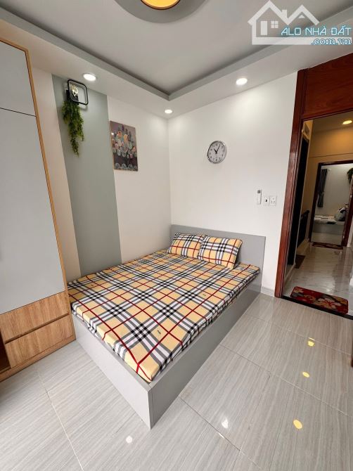 NHÀ HXH TRƯỜNG SA - PHẠM VĂN HAI -40m2 -4 TẦNG -4 PN - SỔ A4