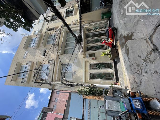Bán toà CHDV phường 3 ,Quận 10 .DT:8x10m .4 tầng ,TM .11p .Giá :14.5 tỷ