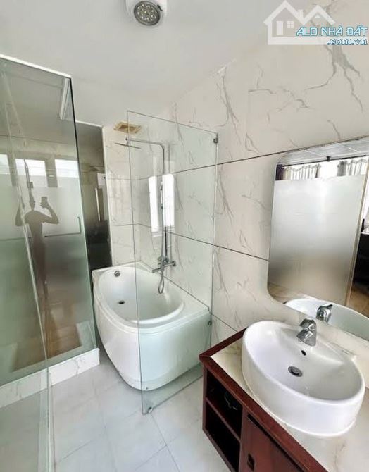 Bán khách sạn hẻm 98 Trần Phú - hẻm thông góc 2 mặt tiền, mới đẹp - 2
