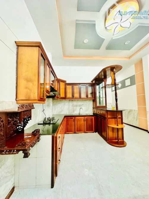 nhà 1 trệt 2 lầu mặt tiền đường lê chân kdc 91B, giá bán 7 tỷ 200 triệu. - 2