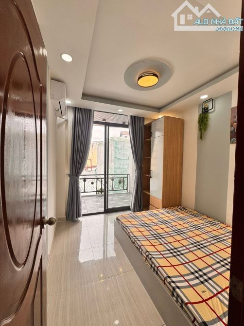NHÀ HXH TRƯỜNG SA - PHẠM VĂN HAI -40m2 -4 TẦNG -4 PN - SỔ A4 - 3