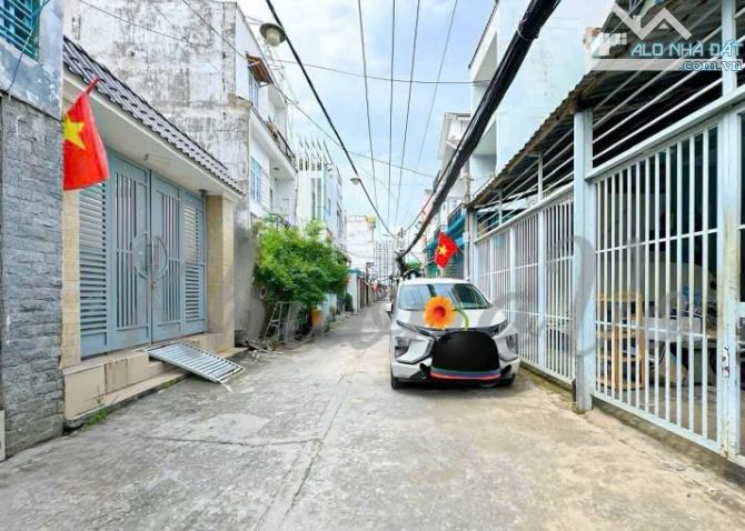 🔥HIẾ.M🔥  QUẬN 7 - SÁT PMH - XE HƠI ĐỖ CỬA - 4 TẦNG MỚI - 66M2 - HƠN 7T