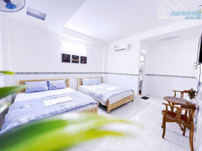 Bán KS 4 tầng đường HÀ HUY GIÁP phường THẠNH XUÂN Q12,dt168m².DÒNG TIỀN 130 triêụ/th - 4