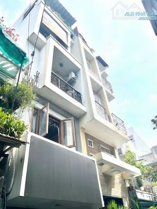 Nhà đẹp Phú Nhuận-Đường ô tô 10M-Tiện KD-Giáp Q1-Huỳnh Văn Bánh-P11-32m2-5tầng