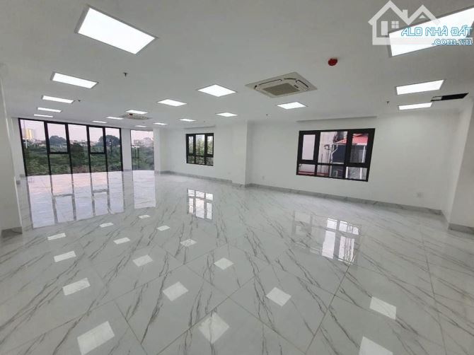 Bán nhà mặt phố Tam Trinh, 100m2 x 8 tầng, lô góc, MT 6m - 1