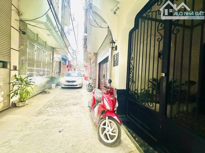 PHỐ THỊNH LIỆT -Trung tâm và gần Quận Ủy Hoàng Mai,-Ô TÔ ĐỖ CỬA - 50m2- 5 tầng - 17
