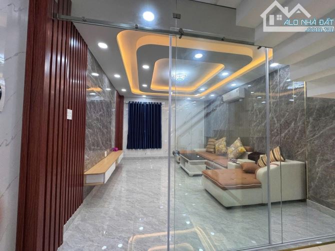 BÁN TRẦN THỊ NĂM Q12 - 5 TẦNG 56M2 ( 4M X 14M) - HẺM XE HƠI THÔNG - 6.65 TỶ. - 3