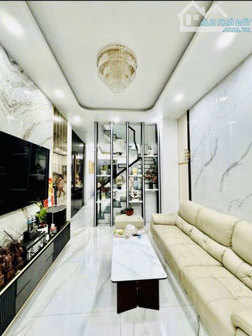 BÁN NHÀ HẺM OTO NƠ TRANG LONG. NHÀ 4 TẦNG, 4 PHÒNG NGỦ, THIẾT KẾ HIỆN ĐẠI CÒN RẤT MỚI