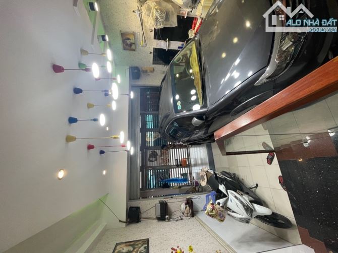 Nhà Q7, mặt tiền đường 12m, ô tô ngủ trong nhà, 5x20m, 4 tầng, nhỉnh 14 tỷ