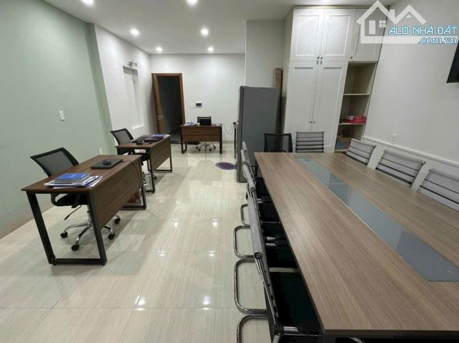 Nhà 4lầu thang máy siêuđẹp sổ đỏ 99m2 mặt 5m hướng TN trục phố kd sầm uất A2 Văn Tiến Dũng