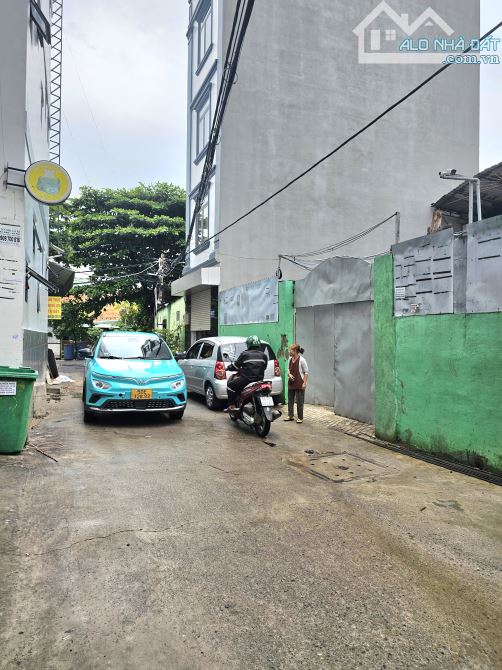 Thu nhập 2ty/nam tòa nhà 26 CHDV full NT ngang 10m hầm 5 tầng ngay cổng ĐH Văn Lang - 1
