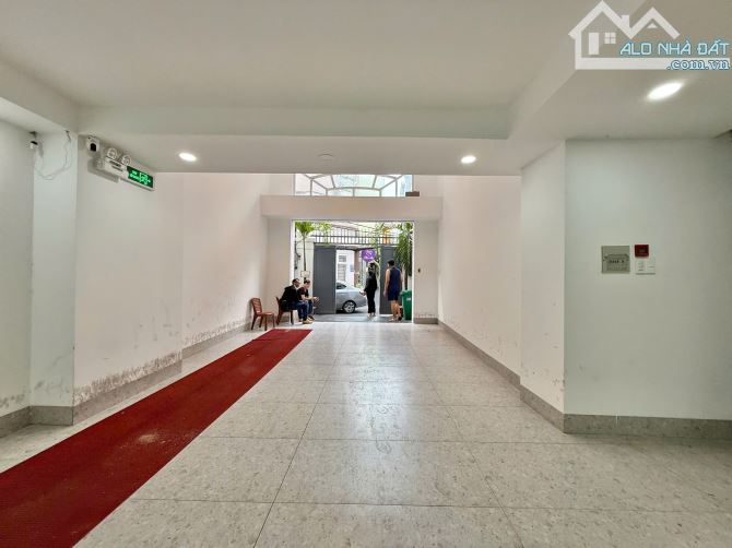 Tòa nhà 12P CHDV thu nhập 140 triệu khu đường Hoa Phan Xích Long 5x28m, 7 tầng, 23.5 tỷ - 1