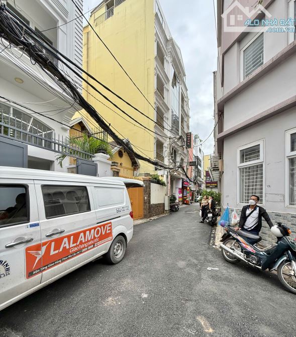Tòa nhà 12P CHDV thu nhập 140 triệu khu đường Hoa Phan Xích Long 5x28m, 7 tầng, 23.5 tỷ - 9