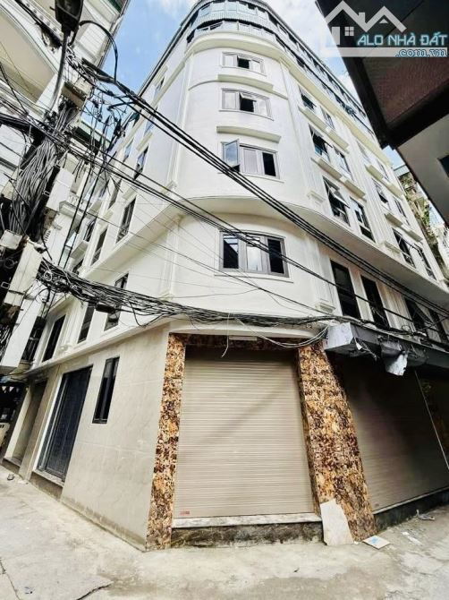NHÀ MỚI - OTO 4 CHỖ VÀO NHÀ - 7 TẦNG THANG MÁY - NGÕ THÔNG - HÀNG XÓM KĐT ĐẠI KIM