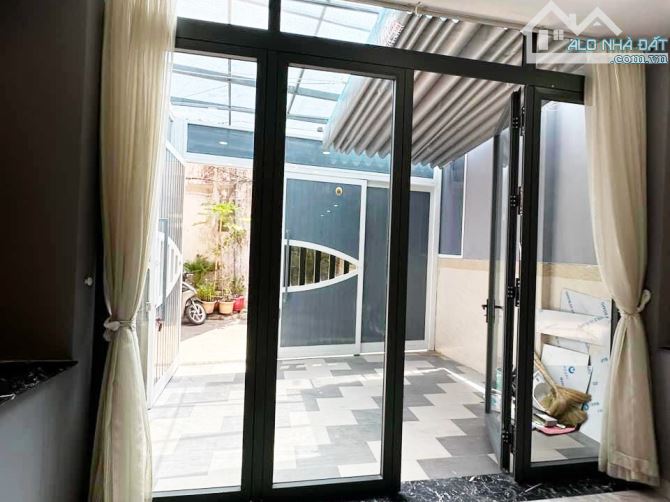 Bán nhà nở hậu 1 lầu sát mặt tiền hẻm An Dương Vương Quận 5 - 1