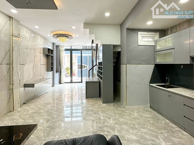 Bán nhà nở hậu 1 lầu sát mặt tiền hẻm An Dương Vương Quận 5 - 2