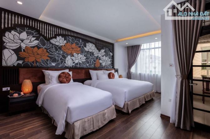 BÁN KHÁCH SẠN 7 TẦNG MẶT PHỐ QUẬN HOÀN KIẾM - 1