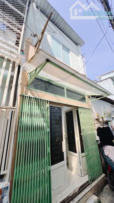 NHÀ 2 TẦNG TẠI TÔN ĐẢN F15 - CÁCH HXH 100m - HẺM 3m THÔNG THOÁNG SẠCH SẼ - 1