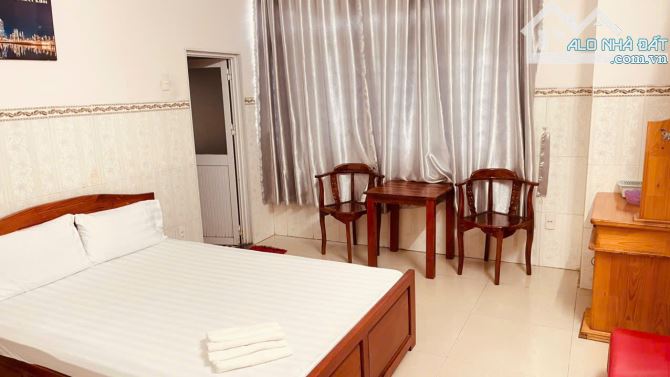 Khách sạn gần BigC Go Dĩ An, 6 tầng 18 phòng thu nhập 30 triệu, 693 Đông Hòa - 5