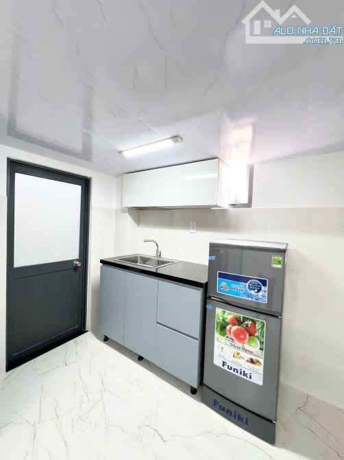 Bán nhà MT Dương Quảng Hàm - Đường số 20  có dòng thu nhập 100 triệu/ tháng P.5 Q.Gò Vấp - 4